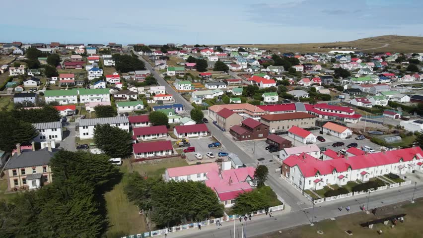 Panning over the vibrant houses and buildings of stanley, falkland islands, showcasing a colorful urban landscape