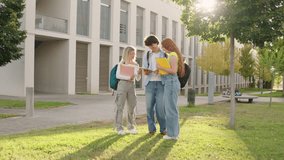 University students collaborating on outdoor group project in sunlit campus - Powered by Shutterstock - Get 15% off with code: PIKWIZARD15