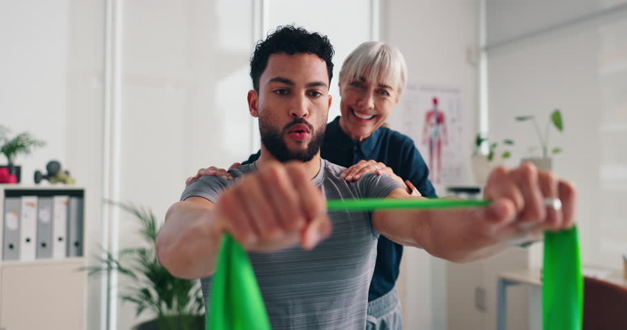 Resistance band, physiotherapy and woman with client for rehabilitation, recovery and consulting. Healthcare, medical service and person with patient for physical therapy, stretching and wellness