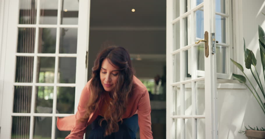 Woman, box and surprise for delivery at front door with smile, excited and product with e commerce in home. Person, client and happy with package, deal and wow for fast distribution with supply chain