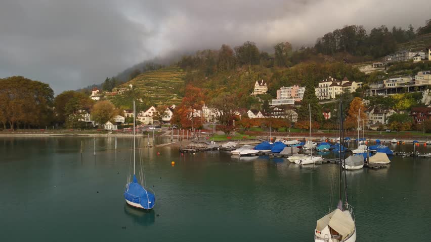 Swiss village Weesen Switzerland nature hill houses by lake Walen Walensee