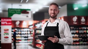 Supermarket Store Trainee Employee. Happy Man In Grocery Shop - Powered by Shutterstock - Get 15% off with code: PIKWIZARD15