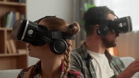 Modern Caucasian family little kid parent man wearing VR headset virtual reality glasses at home child girl guy father play 3D digital game male dad daughter enjoy metaverse innovative AR cyber tech - Powered by Shutterstock - Get 15% off with code: PIKWIZARD15