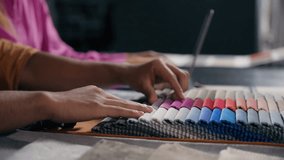 Male female hands touch choose color fabric samples collaborate fashion designers textile buying clothes online typing laptop unrecognizable woman man tailor dressmaker choosing cloth catalog on table - Powered by Shutterstock - Get 15% off with code: PIKWIZARD15