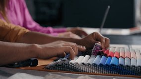 Male female hands touch choose color fabric samples collaborate fashion designers textile buying clothes online typing laptop unrecognizable woman man tailor dressmaker choosing cloth catalog on table - Powered by Shutterstock - Get 15% off with code: PIKWIZARD15