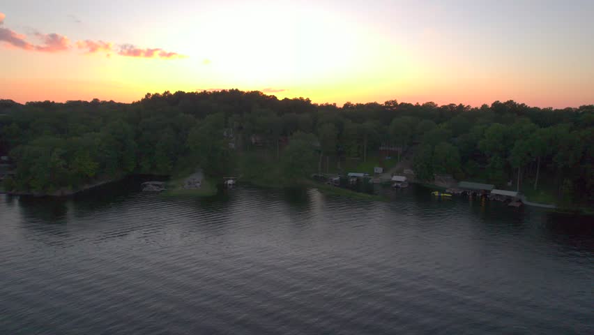 Rising up drone view of a sunset on Lake of Egypt, Southern Illinois