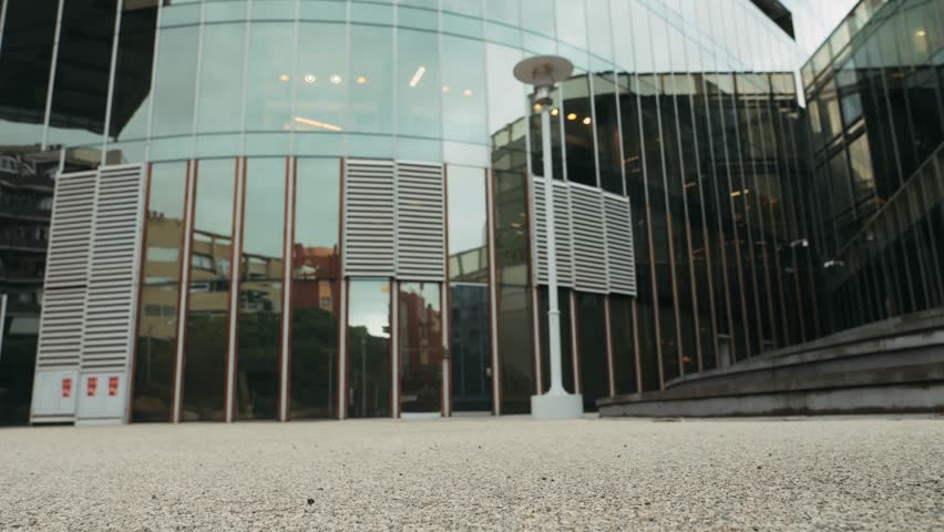 Tourist man with suitcase baggage in spain, A traveler with luggage suit jacket on business street go to a hotel, business office, airport terminal, enjoying the vibrant atmosphere