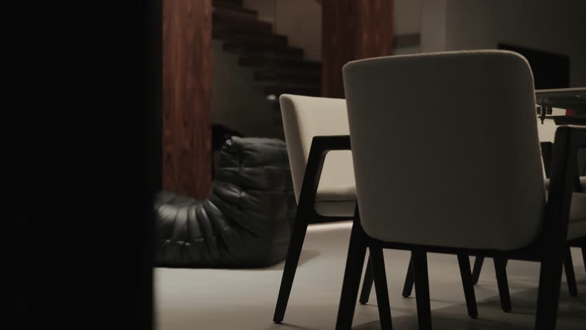 A Modern Living Space Featuring Minimalist Furniture Accompanied by a Cozy Bean Bag Chair
