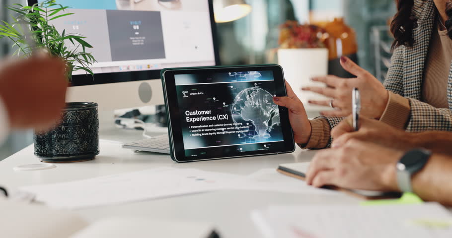 Customer experience, hands and tablet with designer people in office for education, meeting or planning. Collaboration, documents and global info on screen with business group in workplace together