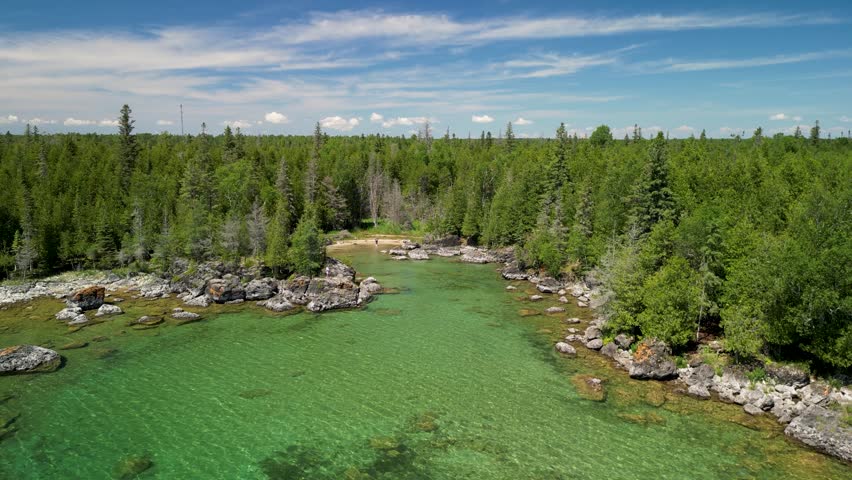 Aerial view of small cove beach on lake huron coastline