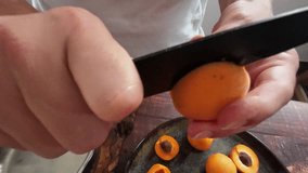 hands close up make a saucepan with apricots and sugar cooking apricot jam - Powered by Shutterstock - Get 15% off with code: PIKWIZARD15