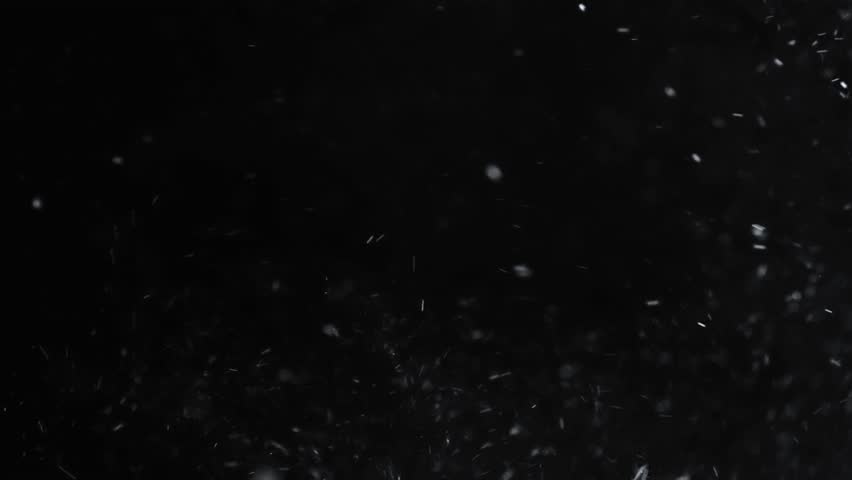 winter, season and christmas concept - snow falling over black night sky