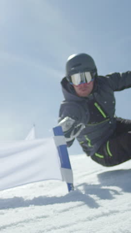 SLOW MOTION: Professional snowboarder at slalom training in ski resort