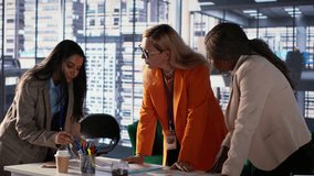 General director reviewing data analytics with her team for successful development plan, working to expand the enterprise globally. Female CEO showing great leadership skills in a meeting. Camera A. - Powered by Shutterstock - Get 15% off with code: PIKWIZARD15