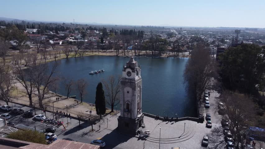 Aerial view of Lake Tajamar, El Reloj Publico and Jesuit church in the city of Alta Gracia in the province of Cordoba in Argentina.