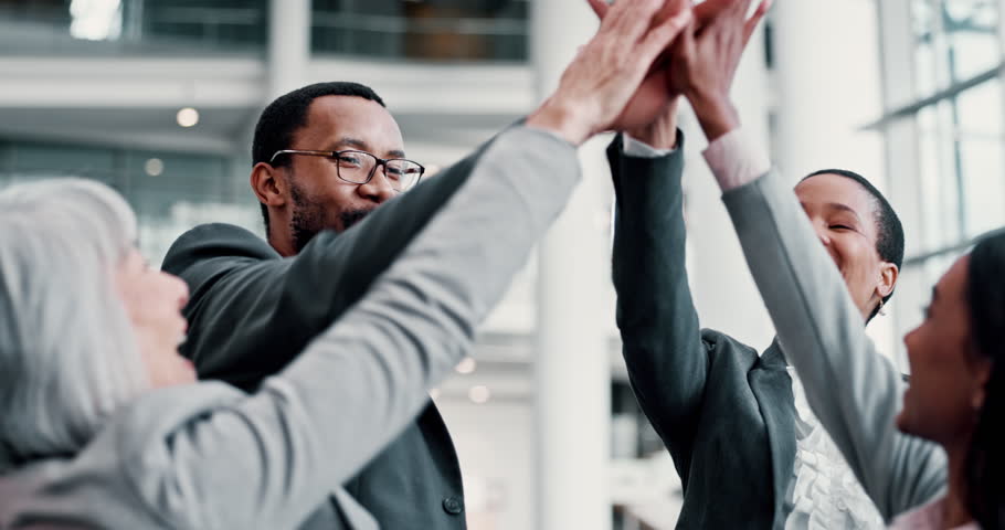 Applause, high five and success with business people at conference center for networking, support and solidarity. Diversity, partnership and connection expo with employees for pride and achievement