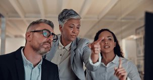 Business people, team and pointing at computer or desktop for discussion, feedback and advice. Women, man and tech as colleagues for mentorship in coworking space, office or collaboration for insight - Powered by Shutterstock - Get 15% off with code: PIKWIZARD15
