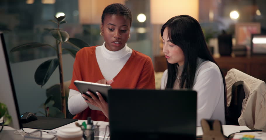 Tablet, advice and woman in office with manager, business plan and online research together at night. Technology, discussion and team at desk for ideas, development or collaboration at digital agency