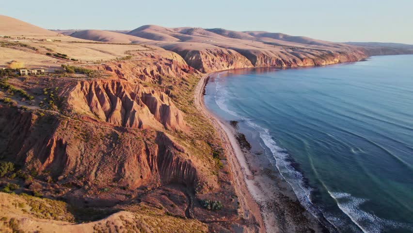 Aerial Drone View of the Australian Coastline at Fleurieu Peninsula – Scenic Cliffs, Rolling Waves, and Coastal Hills in Real-Time