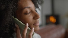 Close-up of woman talking on smartphone in a relaxed setting - Powered by Shutterstock - Get 15% off with code: PIKWIZARD15