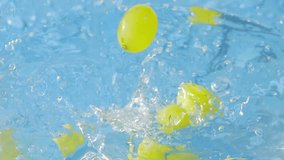 Fresh organic green grapes splashing into water in slow motion 300fps - Powered by Shutterstock - Get 15% off with code: PIKWIZARD15