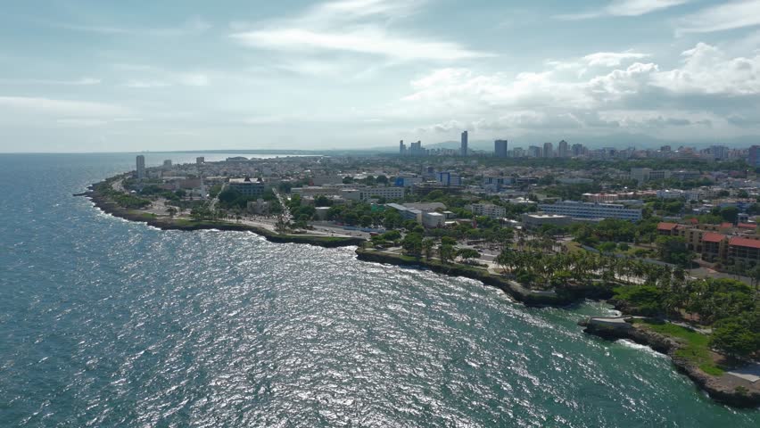 Santo Domingo City Waterfront, Dominican Republic. Aerial VIew of Coastal Traffic, Parks and Buildings From Caribbean Sea