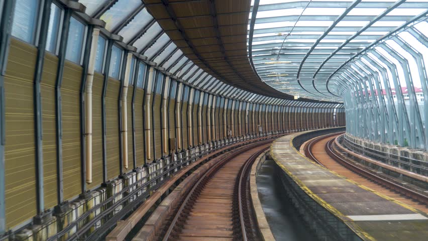 View of railway tracks movement effect of speed with turn perspective on viaduct suspension bridge parallax.
