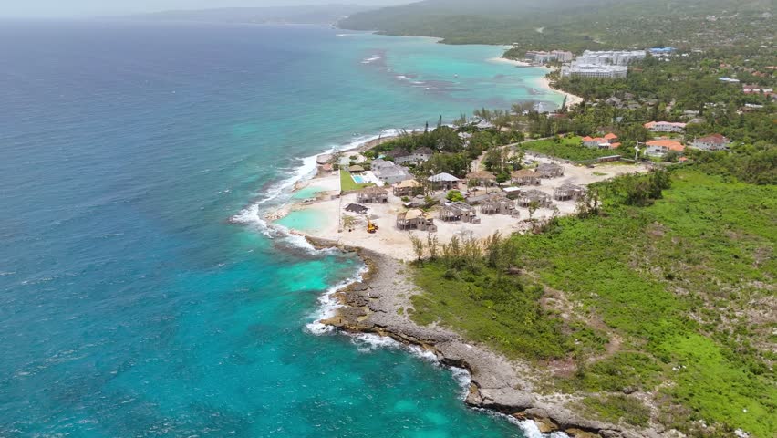 Huts In Jamaica On The Cliff Edge