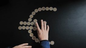 Child dismantling euro symbol with coins, Financial Crisis, Economic Uncertainty - Powered by Shutterstock - Get 15% off with code: PIKWIZARD15