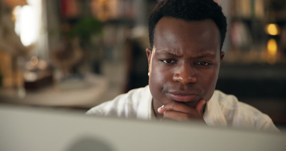 Home, black man and education with computer for reading, thesis research and solution for assessment. House, student distance learning with digital for college essay, studying and thinking for test