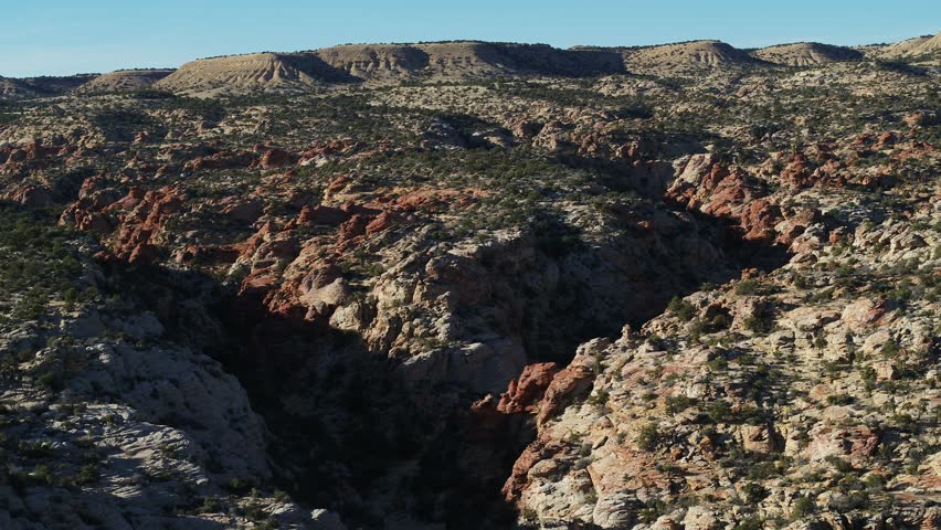 Aerial of canyons in San rafael Swell in Central Utah near Green River at sunset