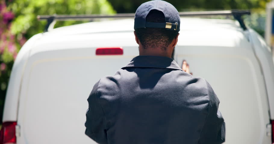 Back, delivery guy and boxes in van outdoor of ecommerce courier, product transport and distribution. Male person, vehicle and cargo package of online shopping, export industry and wholesale shipping