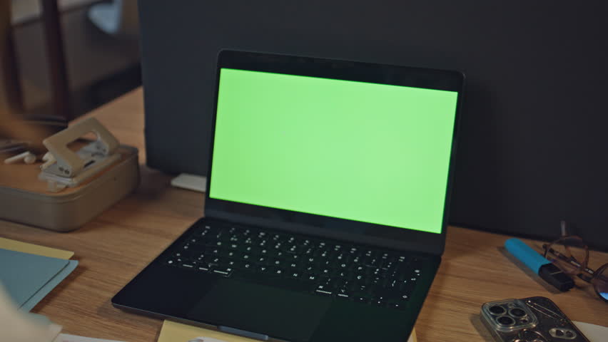 Accountant hands working chromakey laptop at evening office closeup. Unknown busy businesswoman examining documents at mockup computer workplace. Secretary girl fingers flipping cv papers at cabinet