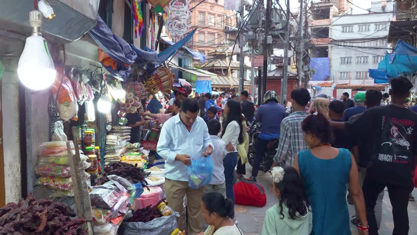 Kathmandu , Nepal - 10 24 2024: Local people doing groceries in the busy city center