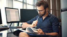 Tax Insurance Broker. Focused business man working on laptop computer reading financial document report in office. Accountant entrepreneur manager businessman doing paperwork finance using pc laptop  - Powered by Shutterstock - Get 15% off with code: PIKWIZARD15