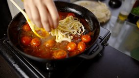 Chef Cooking Pasta Spaghetti On Kitchen. Gourmet Cooking Traditional Italian Pasta Cherry Tomato. Italian Cuisine Dinner Tomato Pasta. Taste Tomato Sauce In Pasta Spaghetti. Homemade Sauce Linguine - Powered by Shutterstock - Get 15% off with code: PIKWIZARD15