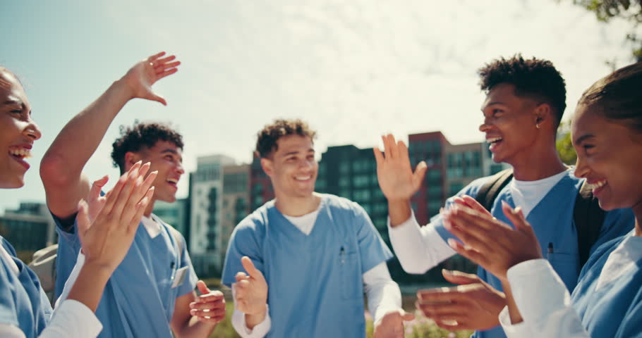 Medical success, students and happy with hands together outdoor for board exams results, good news or education. Healthcare, diversity people or high five in circle with support for study scholarship