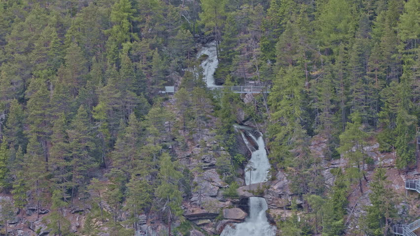 Waterfall in the mountains, cascading 159m over slate cliffs and moss-covered boulders. Stuibenfall Waterfall, Oetztal Valley, Tirol, Austria.