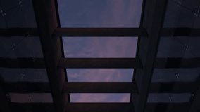 Architectural concrete background with dynamic clouds, sunlight, and glass reflections transitioning from morning to evening. Ideal for urban and architectural themes.  Ultra HD 4K animation - Powered by Shutterstock - Get 15% off with code: PIKWIZARD15