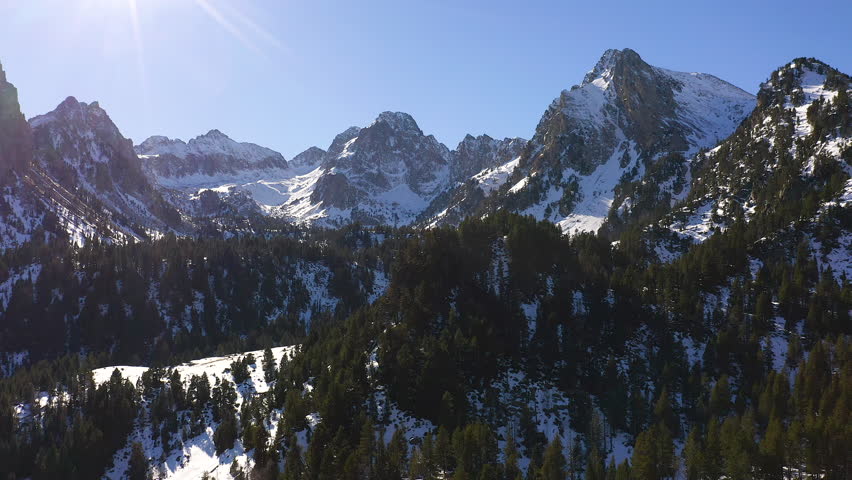 Aerial view of the snowed mountains and hills in the Spanish Pyrenees.