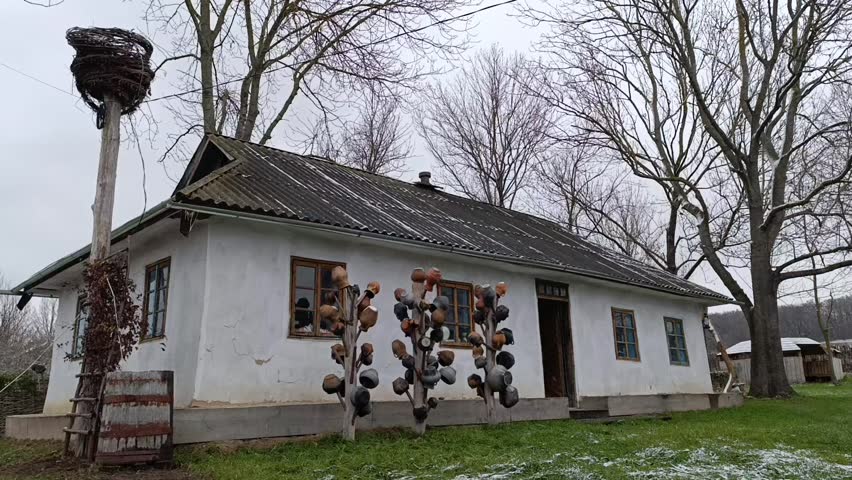 A white house with a bird