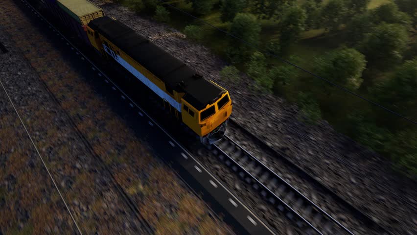 A Freight Train Hauls Shipping Containers Through The Landscape, Sunset And Blue Sky