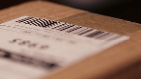 close-up of a barcode on a parcel being scanned by a laser beam from a barcode scanner, parcel delivery point concept - Powered by Shutterstock - Get 15% off with code: PIKWIZARD15