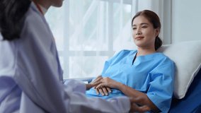 Doctor holds the hand of a smiling patient recovering in a hospital bed, providing comfort and support during recovery - Powered by Shutterstock - Get 15% off with code: PIKWIZARD15