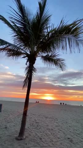 Capturing the serene scene of a calm beach during sunset. Perfect landscape background and summer holiday concept