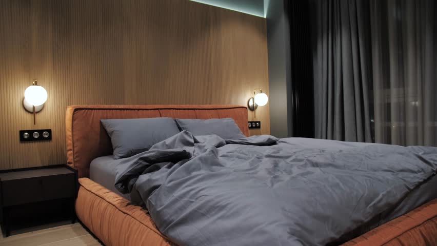 Discover a modern bedroom that embodies a cozy ambiance paired with a stylish design