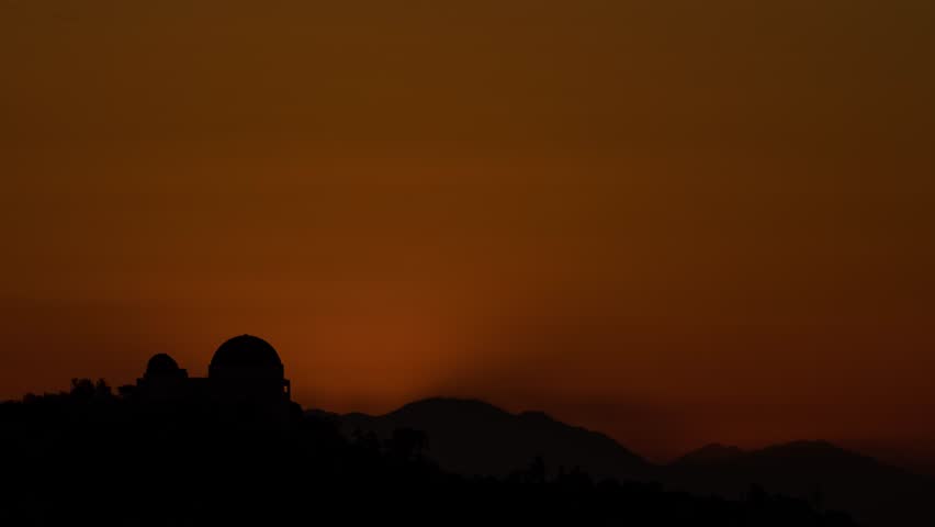Time Lapse of the sun rising behind Griffith Observatory in Los Angeles.