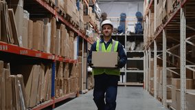 Warehouse Worker Carrying Box for Delivery - Powered by Shutterstock - Get 15% off with code: PIKWIZARD15