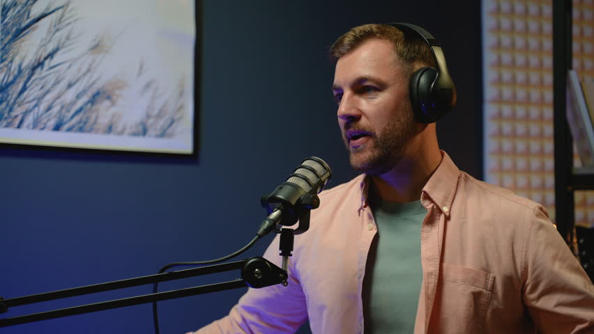 Focused podcast host delivering insights and stories during a live radio broadcast
