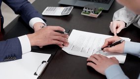 Man signing a real estate contract - Powered by Shutterstock - Get 15% off with code: PIKWIZARD15